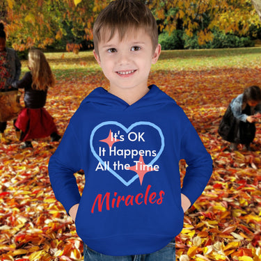 Rabbit Skins toddler fleece hoodie with “Miracles Happen” design and uplifting message, soft cotton-poly blend, jersey-lined hood, Christian apparel for cozy wear and faith-filled gifting, toddler boy in blue hoodie